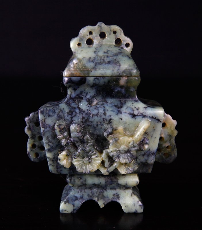 Miniature Chinese Republic Soapstone Urn in Box: In light to dark green with some crystal inclusions, of archaic form, with carved floral front, openwork handles and finial.Â Fits in custom silk box.Â 2.75" H x 2.375" W.Â Excellent conditio