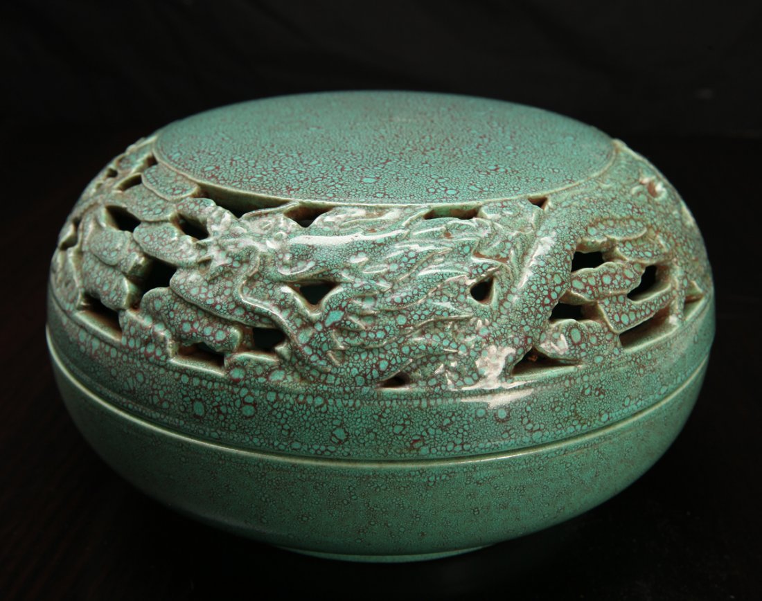 Chinese Jun Yu Porcelain Box: In mottled green with openwork of dragons and clouds. Six character spurious mark on underside. 4' H x 7.25" Dia. Excellent conditon.