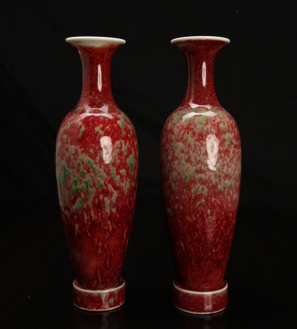 Pair of Chinese Jiang Dou Hong Porcelain Vases: In green to red, each on removeable stand of circle form. Six character mark in blue to each on underside. With stand, measures 8.375" H x 2.375" W. Excellent condition.