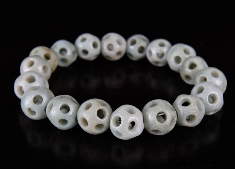 Chinese Jade Bracelet: Each bead in form of puzzle ball, on elastic band. Excellent condition.