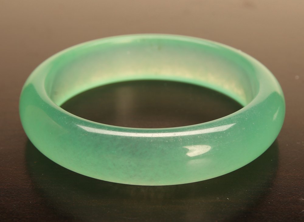 Chinese Hardstone Bangle: In light ice green. 2.375" inside diameter, 3" outside diameter. Excellent condition.