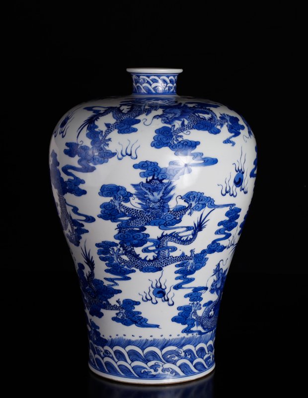 Chinese Mei Ping Porcelain Vase: In blue and white, deocrated depicting dragons, flaming pears, ruyi clouds and waves. Six character mark in blue to underside. 11.75" H x 8" W. Excellent condition.