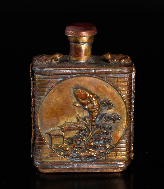Chinese Bronze Snuff Bottle: With two dragon handles, each side with circular design of fish jumping out of water. Four character mark on underside. 2.5" H x 1.75" W. Excellent condition.