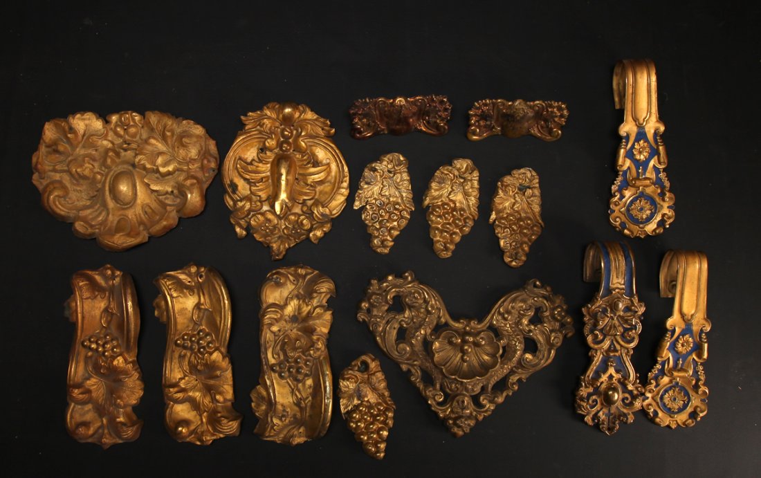 Grouping of Victorian Tinned Brass Decorations: Includes grape and leaf, painted curtain holders and floral designs. Largest measures 10.25" W. All in good condition with tarnish and spotting from age and use.
