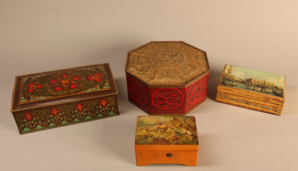 4 Vintage Decorative Boxes: Includes a non-working music box, a cinnibar style tin box, a tin box and a Florentine style box. Largest measures 9" L. Fair condition.
