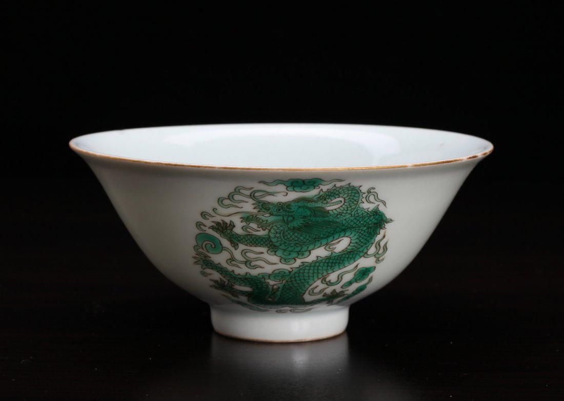 Chinese Porcelain Bowl: Enameled with three medallions of dragons in green to exterior. Six character mark in blue on underside. 2.375" H x 5.375" Dia. Excellent condition.