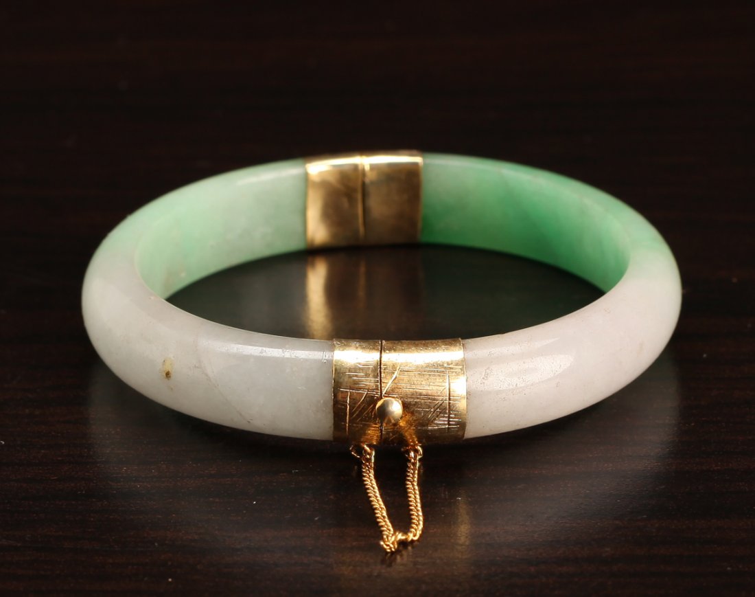 Chinese 14K & Jade Bangle: In green apple to lavender, with 14k gold mountings. 2.25" inside diameter, 2.875" outside diameter. Excellent condition.