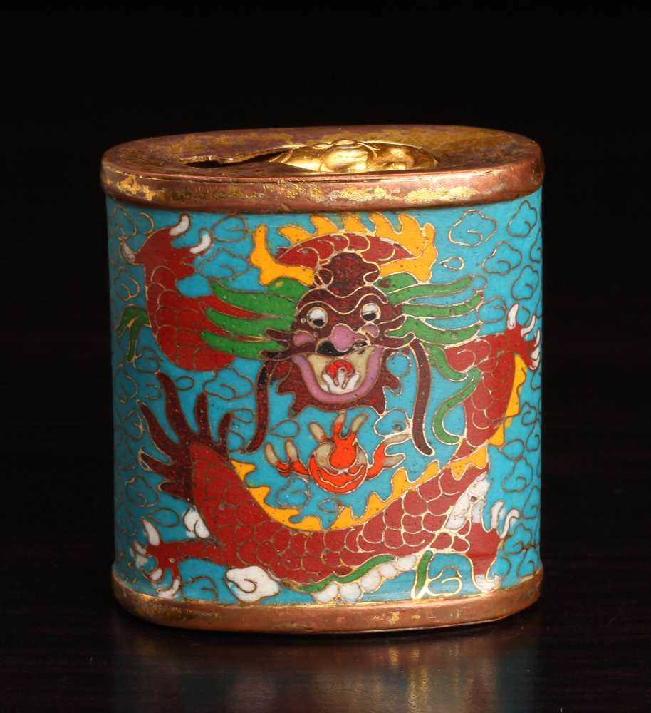 Chinese Cloisonne, Copper & Brass Snuff Bottle: Outer body in a blue field, one side with dragon, the other side with phoenix. Inner body in copper, etched with erotic images on both sides. Lid in brass with raised bat handle which protrudes throug