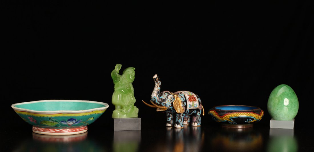 Grouping of Chinese Articles: Includes a turquoise bowl, a cloisonne bowl, a cloisonne elephant, a hardstone egg with stand and a composition statue. Largest measures 6" W. Very good to excellent condition.