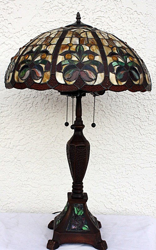 Jeweled Table lamp: Jeweled Table lamp containing qualit hand cut glass and jeweled glass in the shade. The work also contains hand cut glass in the base measuring approx. 30x20x20.