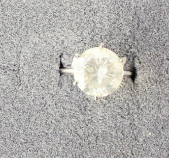 Ladies 6 ct. Diamond Solitaire ring: Ladies 6.0 cts. Round Brilliant cut diamond (faceted), Dimensions 11.61-11.52x7.00 mm, ated I-1 in clarity and I-J in color,very good cut. The diamond is set in a 6 prongg with gold setting.