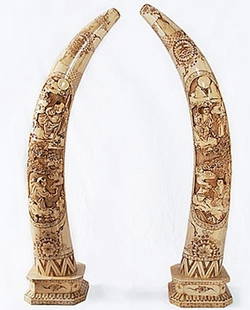 Ornate"Bone Tusk" Pair : One pair of very detailed carved tusk measuring approx. 28h. The works are in very good condition with intricately carved mythological carvings and accents.Quality. Low opening bid.