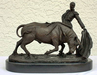 Debut "Matador" bronze sculpture: "Matador" bronze sculpture after Debut measuring approx. 10x12x6 with a brown finish with gold highlights. Mint condition.