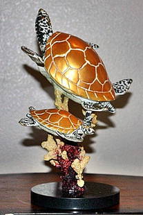 "Turtle Duo" bronze sculpture: "Turtle Duo" bronze sculpture with a multi-color finish measuring approx. 12h7.5x8.5 in good condition