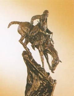 Remington "Mountain Man"bronze sculpture: "Mountain man" after Remington signed with a dark bown patina measuring approx. 27 x18. The sculpture is in very good condition being well maintained.