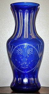 Large Glass Cobalt blue vase: Cobalt blue glass vase measuring approx. 25h with accents in very good condition