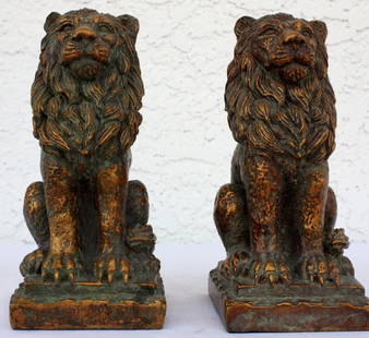 Pair of Lion Sculptures: One pair of Lion sculptures measuring approx. 7Hx3x3.5 with a very good multi-color finish and detail. Good condition.