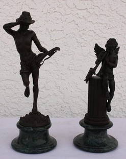 Lot of two musical sculptures: One lot of musical sculptures containing bronze sculptures measuring approx. 11hx4.5x3.5 with a dark brown patina also containing one angel w/trupets bronze sculpture measuring approx.9hx3.5x3.5 with