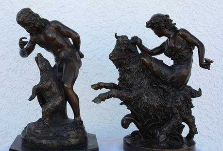 lot "Animalier" bronze sculptures: Lot of "Animalier" sculptures consisiting of one "Boy with bear cub" bronze sculpture measuring approx. 15x9x9 with a brown patina finish and one "Roman on Ram" sculpture measuring approx. 14x12x8