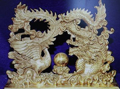 "Dragon and Phoenix of Wisdom" bronze sculpture: "Dragon and Phoenix of Wisdom" bronze sculpture measuring approx. 7.5Hx8.7w. The work is very detailed and very good condition with an excellent finish.