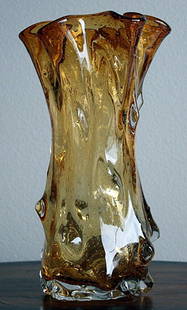 Amber glass vase: Amber glass vase measuring approx. 11h x 6w x 6d in very good condition.