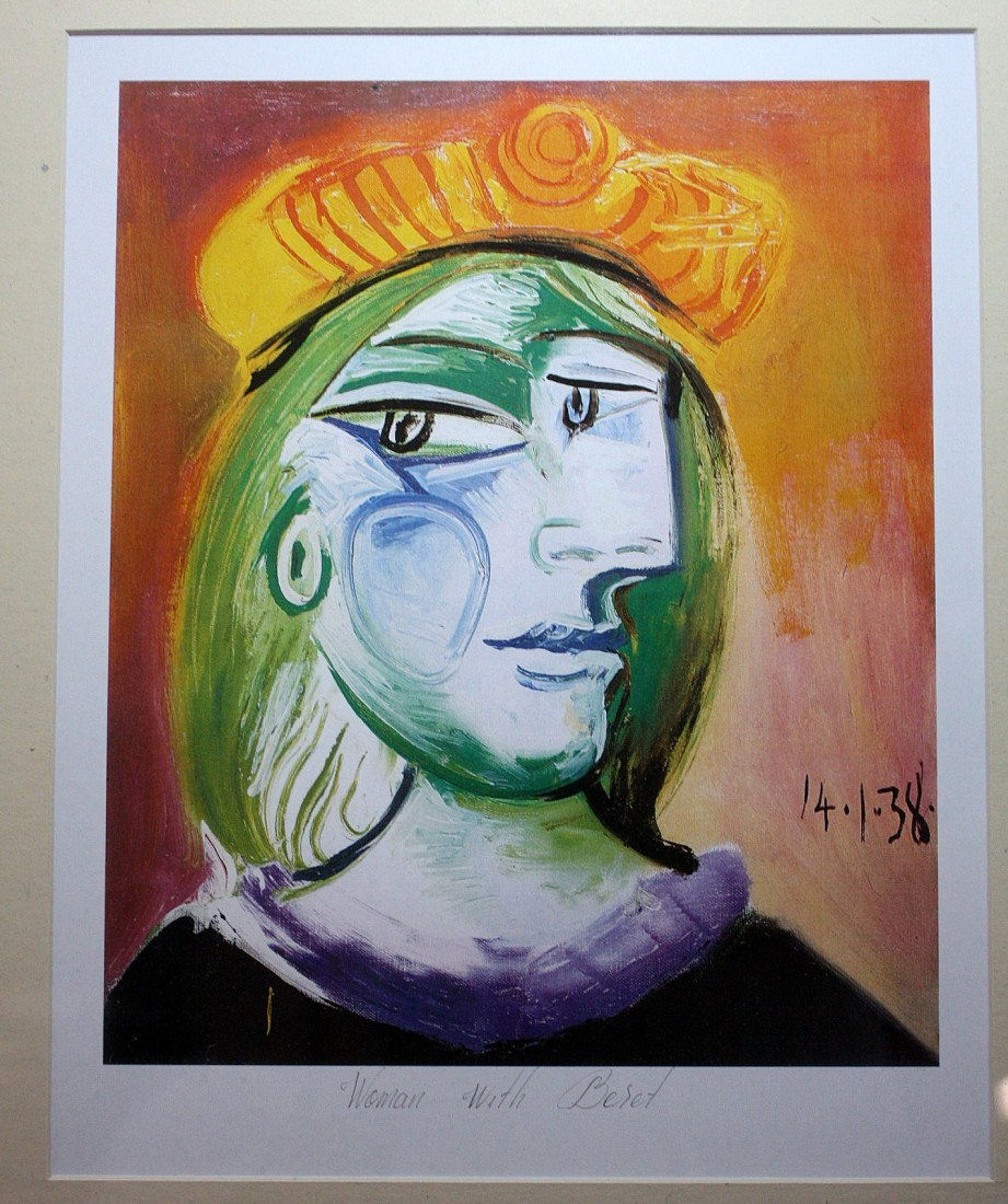 Picasso "Woman with Beret" lithograph: "Woman with Beret" lithograph after drawing. The drawing is taken from one of Picasso's private sketchbooks and the lithography was done in Paris. Image size approx. 19x18.5. Ornate framed and matted.