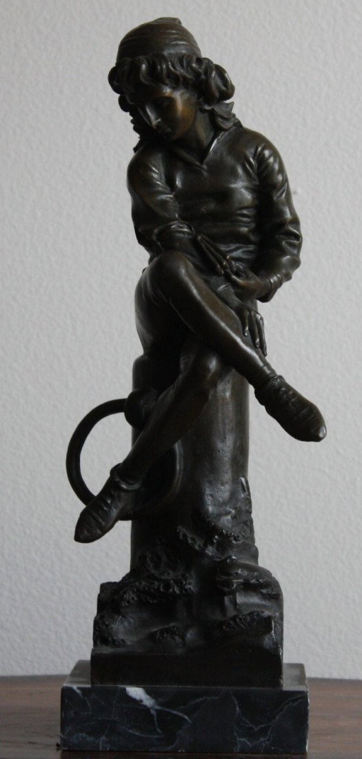 Moreau "Sitting Boy on Pedastel" bronze sculpture: "Sitting Boy on Pedastel" bronze sculpture after Moreau with a brown patina having very good detail and finish measuring approx. 14h x 4w x 4d in very good condition.