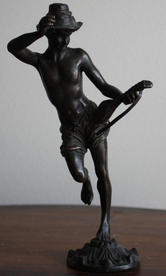 "Harvest boy w/mandolin" bronze sculpture: "Harvest boy with Mandolin" bronze sculpture after Moreau measuring approx. 8h x 5.5w x 3d having a dark brown patina with good detail in cood condition.
