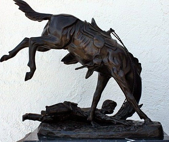 Remington "Wicked Pony" bronze sculpture: "Wicked Pony" bronze sculpture after Frederic Remington measuring approx. 20hx24x10 having a brown finish with very good detail and condition.