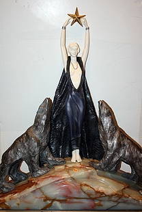 Signed Guiraud Riviere Bronze and Ivory - Nordica: Signed bronze and ivory art deco sculpture "Nordica" by artist Guiraud Riviere, base signed , carved ivory beautiful painted patina bronze, sits on a marble/onyx base. Approx size: 30"x10"x4"