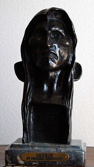 Remington"Savage" bronze sculpture: "Savage" bronze sculpture after Remington measuring approx.12h x 6w x 6d with a dark brown patina. The sculpture has very good detail and finish in very good condition.