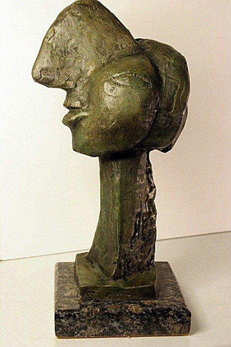 Pablo Picasso Limited Edition Bronze -Female Face: Pablo Picasso signed and numbered bronze sculpture, "Female Face". Some variation in patina might occur. Approx. size: 14x8x6.