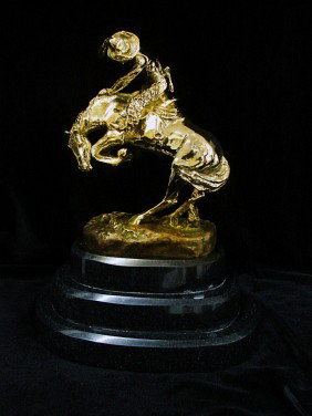 One pair Remington 24K Gold Layered Ltd. Ed. Sculpt: Remington sculpture, "Mountain Man" and "Rattlesnake" are bronze layered with pure 24K gold.Foundry assay included.Very small edition. All works are very unique variation in marble can occur. Mint con