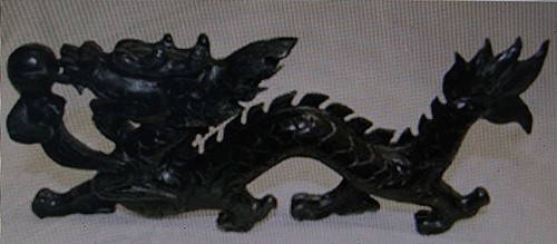 Rare Black Jade Dragon: One black jade dragon (rare) measuring approx. 4.3Hx9.2W with very good form and detail. Hand carved and very good condition.