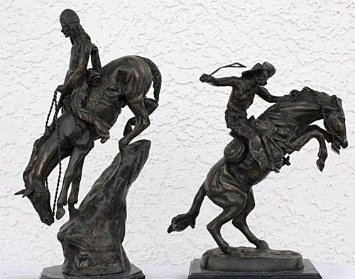 Lot of Remington bronze sculptures: One lot of Remington bronze sculptures containing a "Mountain Man" after Remington measuring approx.15hx7x5 and a "Bronco Buster" sculpture measuring approx. 12hx10.5x4.5 in good condition. Very low o