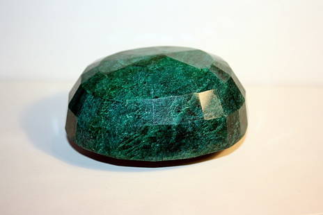 Loose 2295ct Oval Cut Emerald: One loose oval cut emerald weighing 2295.00cts and measuring 79.05 x 94.4 x 45.13mm. The color is green and opaque.