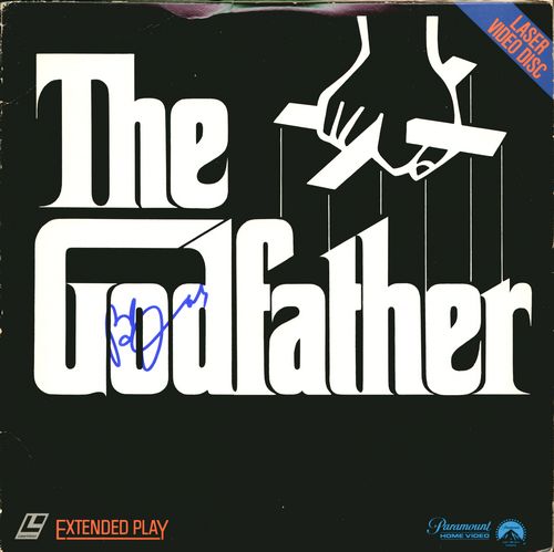 [LASER VIDEO COLLECTION I]: 779. [LASER VIDEO COLLECTION I] Two popular films. Two signed videodisc albums, each 12½"x12½". Discs present. Present are Academy Award winner The Godfather signed by stars ROBERT DUVALL