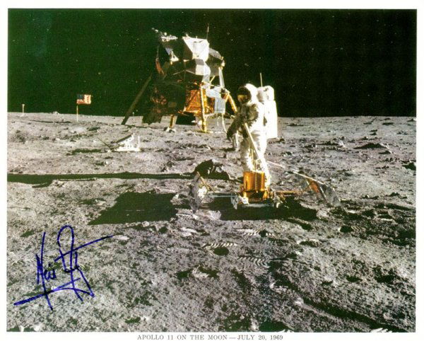 NEIL ARMSTRONG SIGNED LUNAR PHOTOGRAPH: 443. NEIL ARMSTRONG (b.1930). Commander of 1969 Apollo 11 lunar mission and first man to walk on the moon; the first civilian to enter NASA's astronaut program. NASA SP, color, 10"x8" portrait on luna