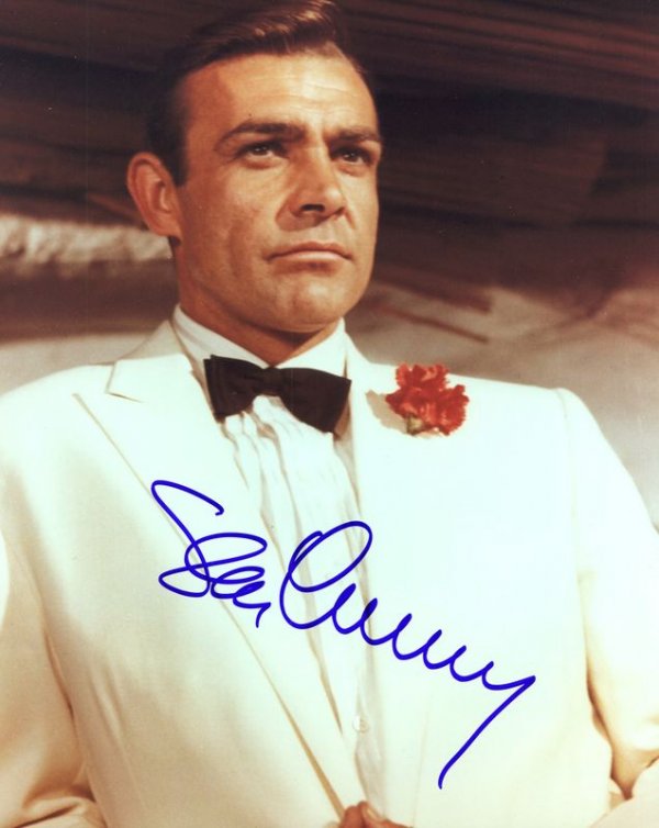 SEAN CONNERY SIGNED PHOTOGRAPH AS JAMES BOND: 717. SEAN CONNERY (b. 1929). Virile Scots leading man who became the definitive James Bond. He won an Academy Award for his performance in The Untouchables (1987). SP, color, 8