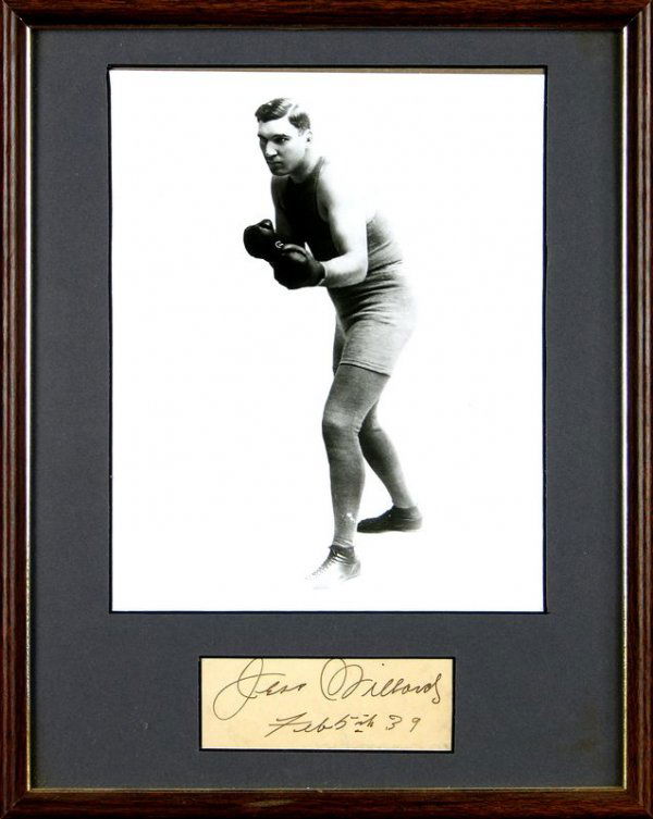 JESS WILLARD SIGNED SIGNATURE W/PHOTO DISPLAY: 998. JESS WILLARD (1884-1968) World heavyweight boxing champion from April 1915 to July 1919. The "Great White Hope" who defeated Jack Johnson in 26 rounds finally lost to Jack Dempse