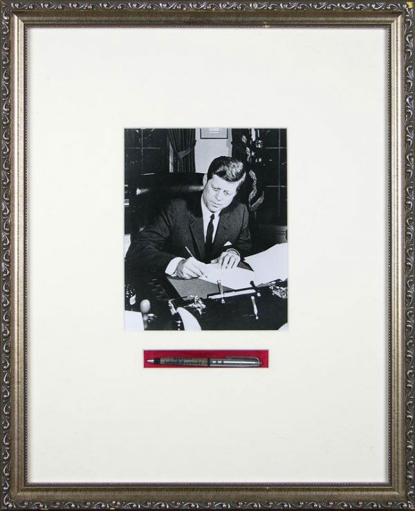 BALLPOINT PEN BELONGING TO SENATOR JOHN KENNEDY: 633. [JOHN F. KENNEDY] Sterling silver Imperial ballpoint pen belonging to Senator Kennedy with stencil cut filigree design on a black barrel with ingraved name "Senator John F. Kennedy" and decorativ