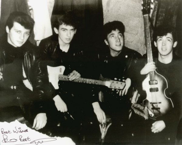 THE BEATLES: PETE BEST SIGNED PHOTO: 905. PETER BEST (b. 1941). Original drummer in The Beatles rock group replaced by Ringo Starr after 1962. SP, b/w, 10"x8" portrait of the very young band members during formative years. Pete is seated