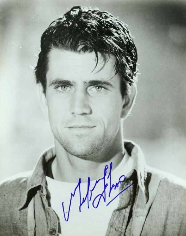 MEL GIBSON SIGNED PHOTOGRAPH: 946. MEL GIBSON (b.1956). Academy Award winning American actor, film director, producer and screenwriter. SP, b/w, quarter-length portrait of the very young actor. Boldly signed in blue felt tip acros