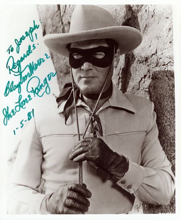 CLAYTON MOORE SIGNED PHOTO: 792. CLAYTON MOORE (1908-1999). Tall leading man of '40s second features, later famous as television's "Lone Ranger." Reproduced SP, b/w, 8"x9¾" half-length still. Boldly inscribed and signed, adding