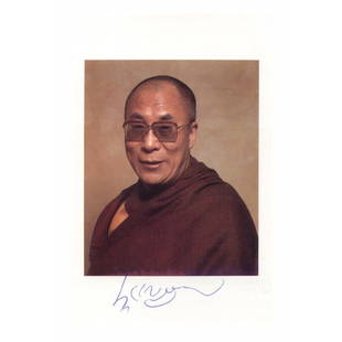 DALAI LAMA: SP, color, 4"x6½", quarter length portrait. Accompanied by original transmittal envelope from the "Office of His Holiness The Dalai Lama." Boldly penned in blue beneath his image. Very fine.