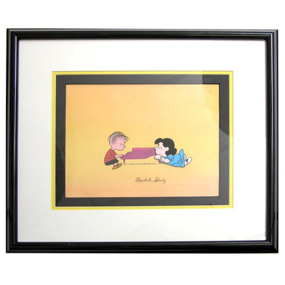CHARLES M. SCHULZ: (1922-2000). The twentieth century's most influential cartoon artist, the creator of Peanuts comic strip. Superb animation hand-painted individual cells of Peanuts characters Linus and Lucy over hand-