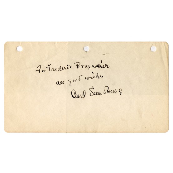 CARL SANDBURG: Vintage signed and inscribed album leaf, "For Frederic Braxmeier all good wishes..." Darkly penned in black ink. Light general toning; three file punch holes at top edge; else Fine.
