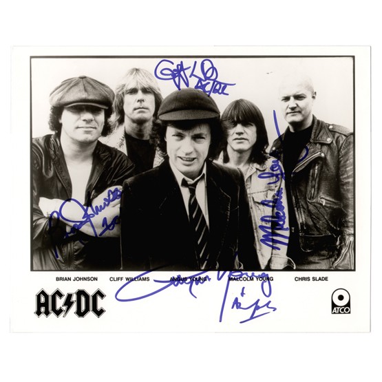 [AC/DC]: Australian hard rock band founded by brothers Angus and Malcolm Young. Promotional SP, b/w, 10"x8" group portrait boldly signed by Angus Young; Malcolm Young; Cliff Williams; and Brian Johnson in blue