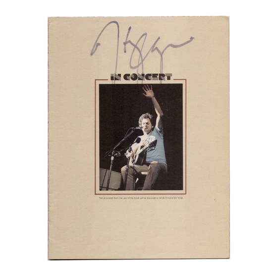 HARRY CHAPIN: (1943-1981). Popular '70s guitarist/singer/songwriter of narrative driven lyrics remembered for his compositions "Taxi" and "Cats in the Cradle." Signed 1977 Tour Book, On The Road. Darkly penned in b