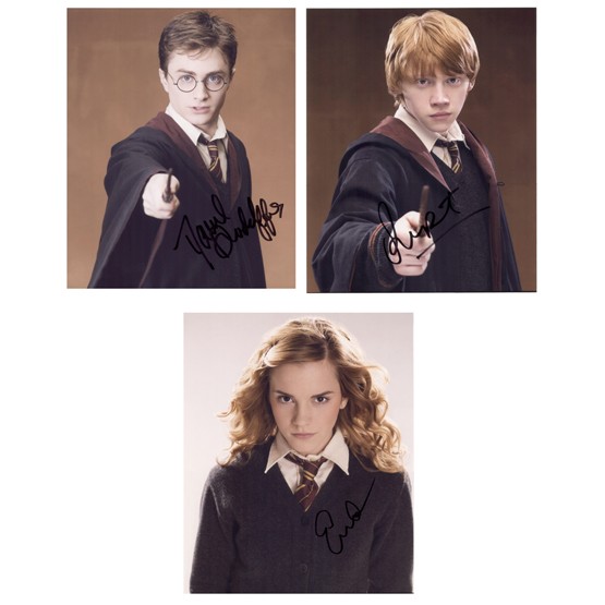 [HARRY POTTER]: Best-selling series of fantasy novels by J. K. Rowling translated to blockbuster films (2001-09). SPs, color, 8"x10" portraits in costume by three of the leading actors: Daniel Radcliffe; Emma Watson 